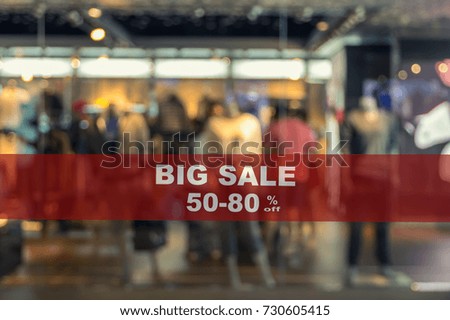 BIG Sale 50-80% off mock up advertise display frame setting over the Abstract blurred photo of clothing store in a shopping mall, shopping concept