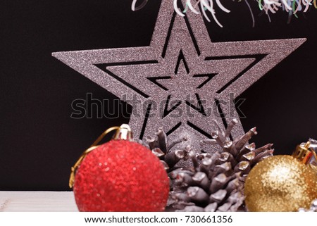 Christmas composition on a dark matte background.
