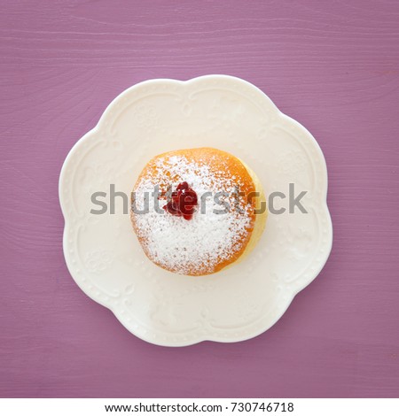 jewish holiday Hanukkah image background with traditional doughnut
