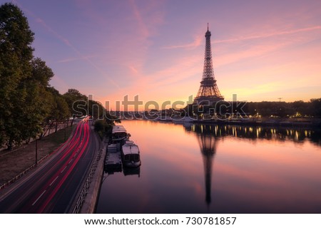 Eiffel Tower and the Seine river at Sunrise, Paris, France Royalty-Free Stock Photo #730781857