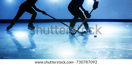 silhouette shot ice-hockey game in winter season game
