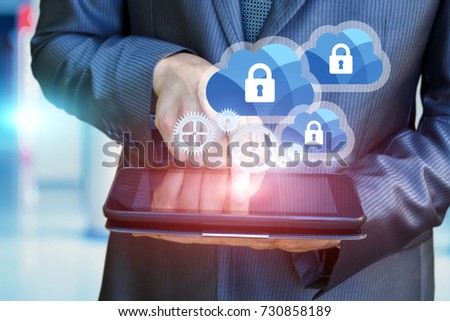 Businessman configures the protection of Cloud computing. The concept of data security.