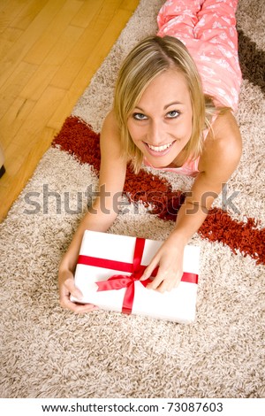 woman's expression of delight of receiving a gift