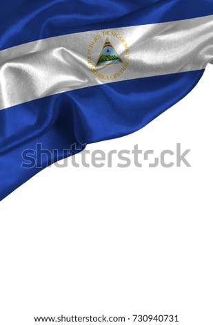 Grunge colorful flag Nicaragua with copyspace for your text or images,isolated on white background. Close up, fluttering downwind.
