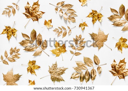 Autumn composition. Pattern made of autumn golden  leaves on  white background. Flat lay, top view, copy space