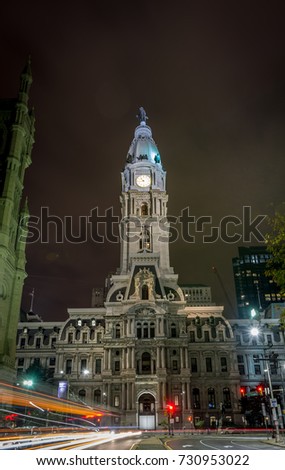 Long Exposure of Philadelphia Pennsylvania City Hall at Night with Traffic Turning onto Broad Street