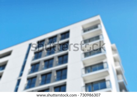Abstract blur of modern apartment building.