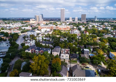 Houston , Texas aerial drone view high above homes businesses and tall buildings in or near Montrose suburban close to downtown Houston Texas