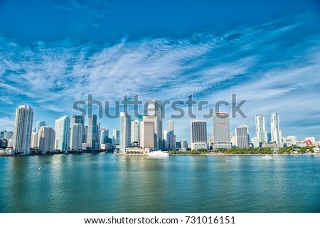 Miami skyline skyscrapers ,yacht or boat sailing next to Miami downtown, Aerial view, south beach