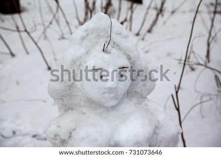 Portrait of a female snowman figure