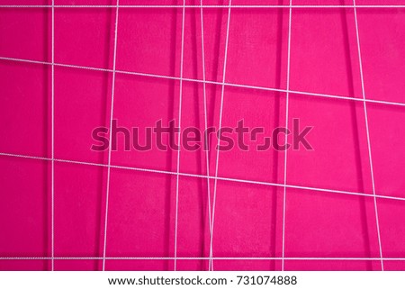 texture of a pink abstract wall with white geometric lines