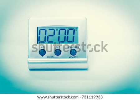 Blurred timer countdown in laboratory.