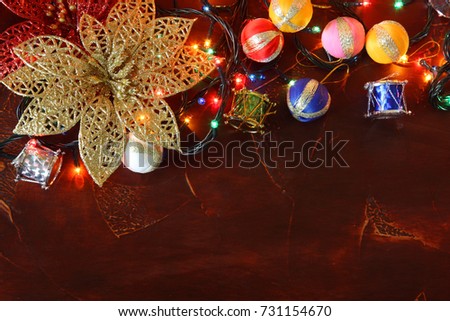 tree decoration on red background with copy space, textured wallpaper, christmas card