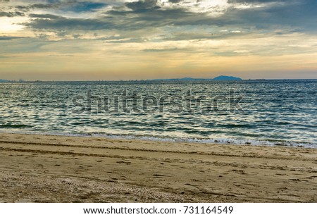 Dramatic dark cloudy sky over sea, natural photo background