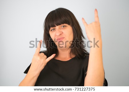 Woman fingers rock