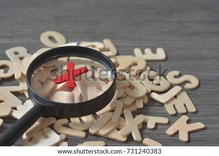 Cross sign element. Red X on magnifying glass