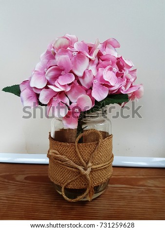 flower vase on a wooden table. nature background.