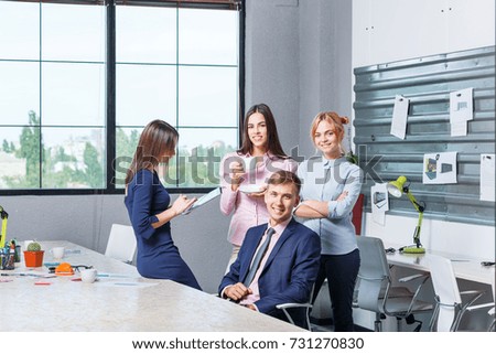 Team of business, friendly office workers in a working office premise