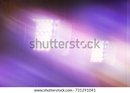 LED video and photography light on light stand in blurred background