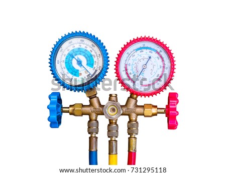 Air Conditioning Refrigerant, Pressure Gauges set isolate on white background. R134a R12 R22 AC Refrigeration charging A/C manifold dual gauge tester. Tools for Air Refill Kits. - Selective focus. Royalty-Free Stock Photo #731295118