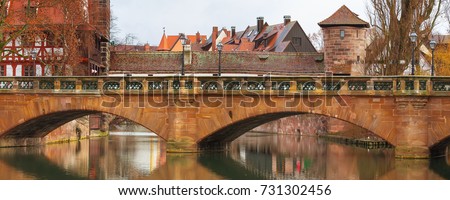 Panorama of old buildings and bridge over the river in Nuremberg, Bavaria