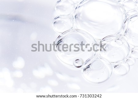 abstract bubbles with bokeh background Royalty-Free Stock Photo #731303242