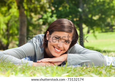 Woman lying down in the park
