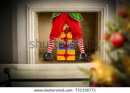 christmas time and elf in fireplace 