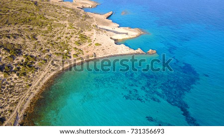 Summer 2017: Aerial birds eye view photo taken by drone depicting beautiful deep blue -
 turquoise water beach