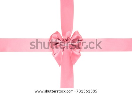 Gift pink bow with crossed ribbon wide ribbon isolated on white
