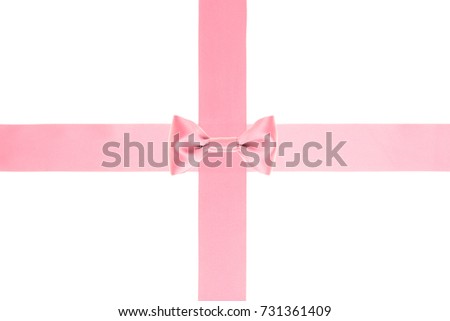 Gift pink bow  with crossed satin ribbon wide ribbon isolated on white background