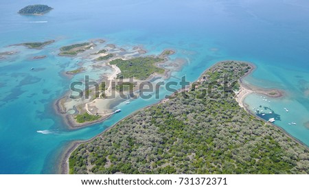 Summer 2017: Aerial birds eye view photo taken by drone depicting beautiful deep blue -
 turquoise water tropical exotic islands
