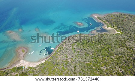 Summer 2017: Aerial birds eye view photo taken by drone depicting beautiful deep blue -
 turquoise water tropical exotic islands