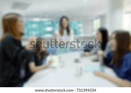 Blurred soft of people meeting at table