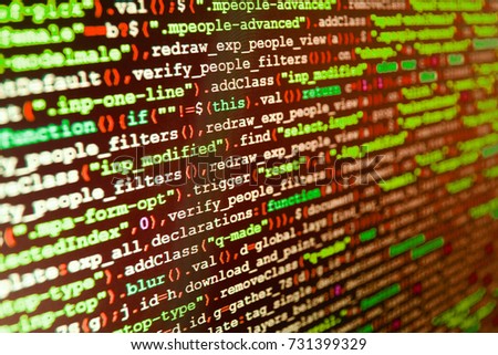 Programming code on computer screen. Computer script typing work.  Script procedure creating. Website programming code. Web site codes on computer monitor. Abstract source code background. 
