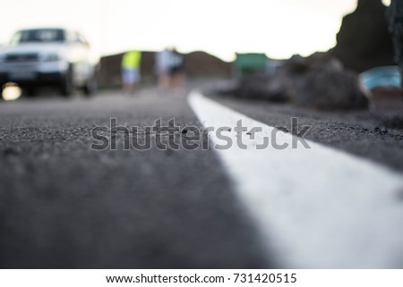 background picture of a blurry road with cars