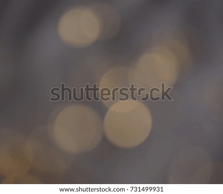 bokeh of water and lights on black background.