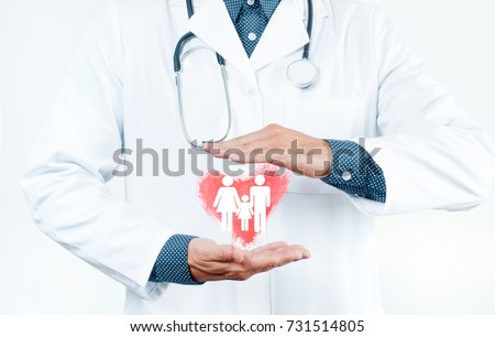 Male Doctor is showing heart shape. Family Insurance Concept Royalty-Free Stock Photo #731514805