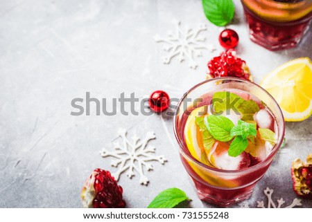 Holiday festive pomegranate drink. Selective focus, space for text. 