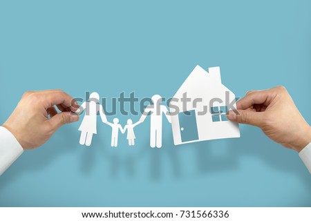 Hand hold house and family Royalty-Free Stock Photo #731566336