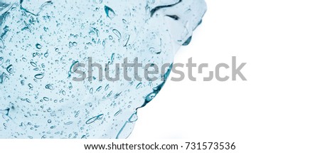 Close up blue cream gel cosmetic or alcohol gel protect virus bacteria covid-19 coronavirus and bubble for background Royalty-Free Stock Photo #731573536