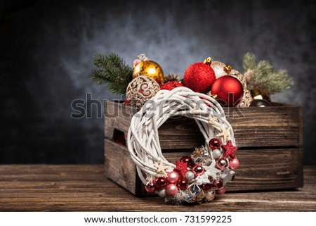 Christmas ornaments in a wooden crate
