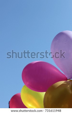 balloons against the sky