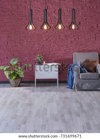 sofa red stone wall textured wooden laminate flooring, empty space