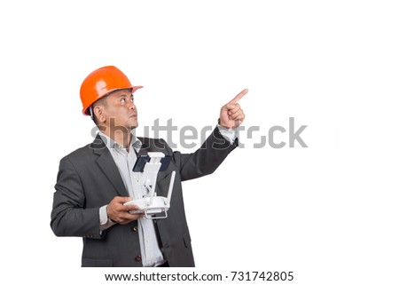 Asian engineer men play drone with remote control isolated on white background.