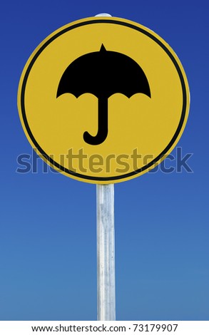 Yellow circular sign on blue background. Sign has a picture of an umbrella on it.