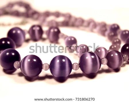 blue beads on a white background