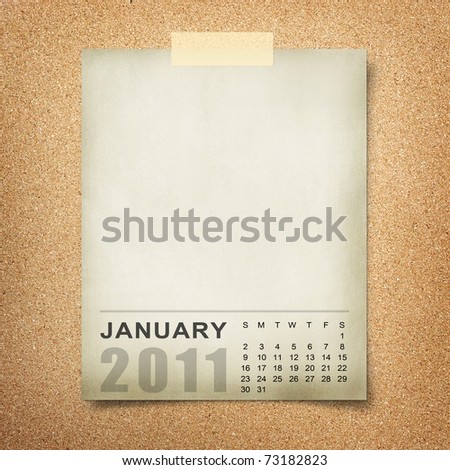 Calendar 2011 Note paper pined on cork board. january