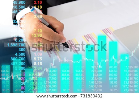 Business man on digital stock market financial positive indicator background. Double exposure of businessman and visual futuristic digital computer stockmarket financial