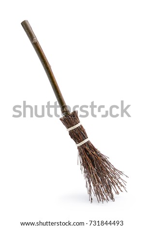 Witch's magic broom isolated on white background Royalty-Free Stock Photo #731844493